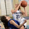 Caylee Wright, right, of Springdale Har-Ber charges into Rogers’ Hannah Hawley on her way to the bas...