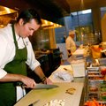 Matt McClure, executive chef, preps one of the stations Thursday in the kitchen of The Hive. The Hiv...