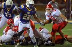 Alabama commit Altee Tenpenny, pictured running the ball against Cabot, was visited by Arkansas coach Bret Bielema and running backs coach Joel Thomas on Thursday.