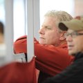 NWA Media/ANDY SHUPE -- Arkansas coach Chris Bucknam, left, and assistant Danny Greene watch Saturda...