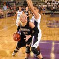 Julia Garrard of Bentonville attempts to score around Fayetteville’s Vanessa Matlock on Friday in Fa...
