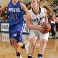Samantha Weber, right, Springdale Har-Ber, looks to the basket Friday under pressure from Rogers Hig...