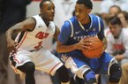 Kentucky's Ryan Harrow (12) works against Mississippi's Derrick Millinghaus (3) during an NCAA college basketball game Tuesday, Jan. 29, 2013, in Oxford, Miss. (AP Photo/Oxford Eagle, Bruce Newman)