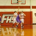 MARK HUMPHREY STAFF PHOTO -- Berryville's 6-foot-6 center, Josh Morrell, works against a Farmington ...