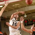 STAFF PHOTO MARC F. HENNING -- Pea Ridge's Nick DeLeon, center, passes the ball off between Gravette...