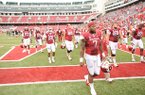 STAFF PHOTO ANDY SHUPE -- Arkansas running back Knile Davis (7) walks off the field after the Razorbacks' 52-0 loss to Alabama Saturday, Sept. 15, 2012, at Razorback Stadium in Fayetteville.