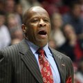Arkansas head coach Mike Anderson yells to his team during their NCAA college basketball game agains...