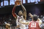 Alabama guard Trevor Lacey (5) takes a leaping shot during an NCAA college basketball game against Arkansas, Thursday, Jan. 31, 2013, in Tuscaloosa, Ala. Alabama won 59-56. (AP Photo/Alabama Media Group, Vasha Hunt)