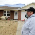 Jeremy Mabry talks Wednesday about some of the damage to his home on Jessica Place in Elkins. 