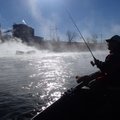 Kenny Stroud of Siloam Springs fishes at Swepco Lake Dec. 21 near the Flint Creek Power Plant. Hot w...