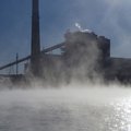 Steam rising from Swepco Lake on a cold morning gives a clue to the warm water temperature at the la...