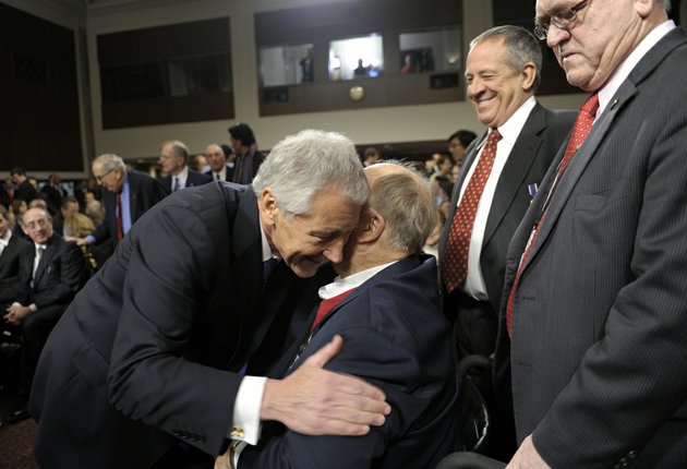 former-nebraska-republican-sen-chuck-hagel-left-president-barack-obamas-choice-for-defense-secretary-greets-former-georgia-sen-max-cleland-center-after-arriving-on-capitol-hill-in-washington-thursday-jan-31-2013-to-testify-before-the-senate-armed-services-committee-hearing-on-his-nomination