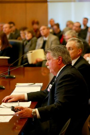Mark Kenneday, vice chancellor for campus operations at the University of Arkansas for Medical Sciences, presents facility plans before the UA board of trustees in Little Rock on Thursday. 