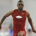 NWA Media/ANDY SHUPE -- Arkansas' Tarik Batchelor completes his second jump Saturday, Jan. 26, 2013,...