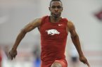 NWA Media/ANDY SHUPE -- Arkansas' Tarik Batchelor completes his second jump Saturday, Jan. 26, 2013, in the triple jump competition during the Razorback Invitational at the Randal Tyson Track Center in Fayetteville.