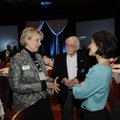 Denise Garner, from left, Dick Trammel, state highway commissioner, and Karen Minkel talk Thursday d...