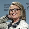 Secretary of State Hillary Rodham Clinton smiles before speaking on American leadership at the Counc...