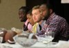 Award winners (left to right) Jimmy Jean of Arkansas Baptist, Jamal Nixon of the University of Arkansas Monticello, Tanner Marsh of Arkansas Tech, and Kelvin Martin of Harding listen to introductions Friday afternoon during the Little Rock Touchdown Club awards banquet.