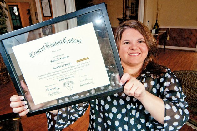maria-edwards-executive-director-of-life-choices-in-conway-holds-her-diploma-from-central-baptist-college-she-will-be-honored-as-outstanding-youth-alumna-at-a-luncheon-feb-16-during-cbcs-homecoming-feb-15-16