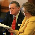 University of Arkansas at Fayetteville Chancellor G. David Gearhart and Provost Sharon Gaber listen ...