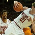 NWA Media/MICHAEL WOODS --02/02/2013-- Arkansas forward Hunter Mickelson pulls in a rebound during t...