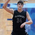 Payton Henson of Siloam Springs celebrates after scoring his 2,000th career point Friday during the ...