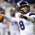 STAFF PHOTO SAMANTHA BAKER -- Austin Allen of Fayetteville High School looks downfield for an open r...