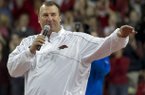 Arkansas head football coach Bret Bielema speaks during a time out in the first half of a NCAA college basketball game against Tennessee in Fayetteville, Ark., Saturday, Feb. 2, 2013. Arkansas defeated Tennessee 73-60. (AP Photo/Gareth Patterson)