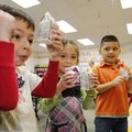 Christian Duenas, 5, from left, Jennifer Rameriz, 5, and Yair Bermjo, 5, students in Kim Westphal’s ...