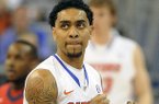 Florida guard Mike Rosario (3) looks toward the score board during the second half of an NCAA college basketball game against Mississippi in Gainesville, Fla., Saturday, Feb. 2, 2013. Rosario scored 14 points as Florida defeated Mississippi 78-64. (AP Photo/Phil Sandlin)