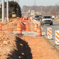 Construction barrels and reflectors line Arkansas 102. 
