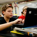 Nick Fletcher, left, and Eli Simek, both sixth-graders at Oakdale Middle School, work Friday on thei...