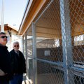 Steve Milligan, left, and Randy Ward, both with Modern Fence & Supply in Springdale, look over one o...