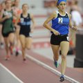 Rogers’ Maggie Montoya competes in the mile run Saturday during the state indoor track and field cha...