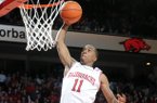 Arkansas' BJ Young dunks the ball in the second half of the game Tuesday, Feb. 5, 2013, against No. 2 Florida at Bud Walton Arena in Fayetteville. Arkansas upset the Gators, 80-69.