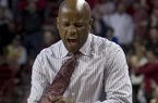 Arkansas' head coach Mike Anderson celebrates after a foul call during the second half an NCAA college basketball game against Florida in Fayetteville, Ark., Tuesday Feb. 5, 2013. Arkansas defeated No. 2 Florida 80-69. (AP Photo/Gareth Patterson)