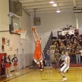 Farmington senior Matt Brackett scores on a fastbreak. Pea Ridge and Farmington battled for the 1-4A...