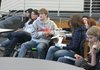 Student members of Rogers Heritage Espirits Requis book club write out questions for New Zealand author Brian Falkner during a Skype visit on Friday, Feb. 1, 2013. Falkner is the second author this school year to visit the Heritage club through videoconferencing.