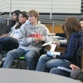 Student members of Rogers Heritage Espirits Requis book club write out questions for New Zealand aut...