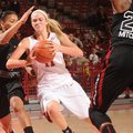 Arkansas sophomore guard Calli Berna, center, drives with the basketball as South Carolina senior gu...