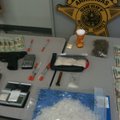 A display of items seized by the Benton County Sheriff's Office in a Rogers drug sting.