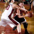 Ashley Ward of Rogers Heritage tries to get around Springdale’s Ashley Dederich on Tuesday in Spring...