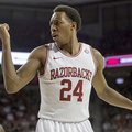 Arkansas' Michael Qualls argues a call during the first half an NCAA college basketball game against...