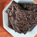 These dark chocolate brownies combine brown sugar, almond meal and sorghum flour to stay gluten free...