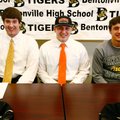 Trevor Foster, from left, John Donald and Gavin Shadrick sit together following a letter of intent s...