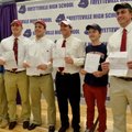 Fayetteville High students Jared Thurman, from left, Brooks Ellis, Alex Brignoni, Austin Allen, Luke...