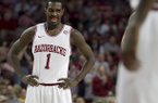 Arkansas' Mardracus Wade (1) smiles after a made free-throw during the first half an NCAA college basketball game against Florida in Fayetteville, Ark., Tuesday, Feb. 5, 2013. (AP Photo/Gareth Patterson)
