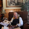 J.D. Fletcher of Eagle Rock, Mo., has 40 to 50 albums of photos, letters and newspaper and magazine ...