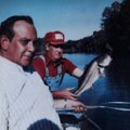 Fletcher shows a largemouth bass caught during one of his float trips.
