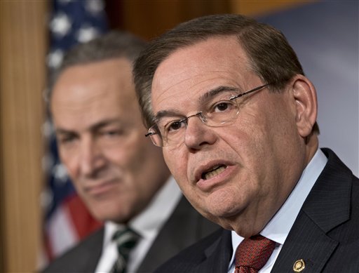 in-this-monday-jan-28-2013-file-photograph-sen-robert-menendez-d-nj-right-and-sen-charles-schumer-d-ny-left-announce-with-other-senators-that-they-have-reached-agreement-on-the-principles-of-sweeping-legislation-to-rewrite-the-nations-immigration-laws-during-a-news-conference-at-the-capitol-in-washington-menendez-said-monday-feb-4-2013-that-allegations-that-he-engaged-with-prostitutes-in-the-dominican-republic-are-false-smears-he-said-he-has-done-nothing-wrong-and-that-allegations-otherwise-are-totally-unsubstantiated